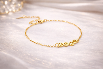 Bracelet patte de chien dorée  