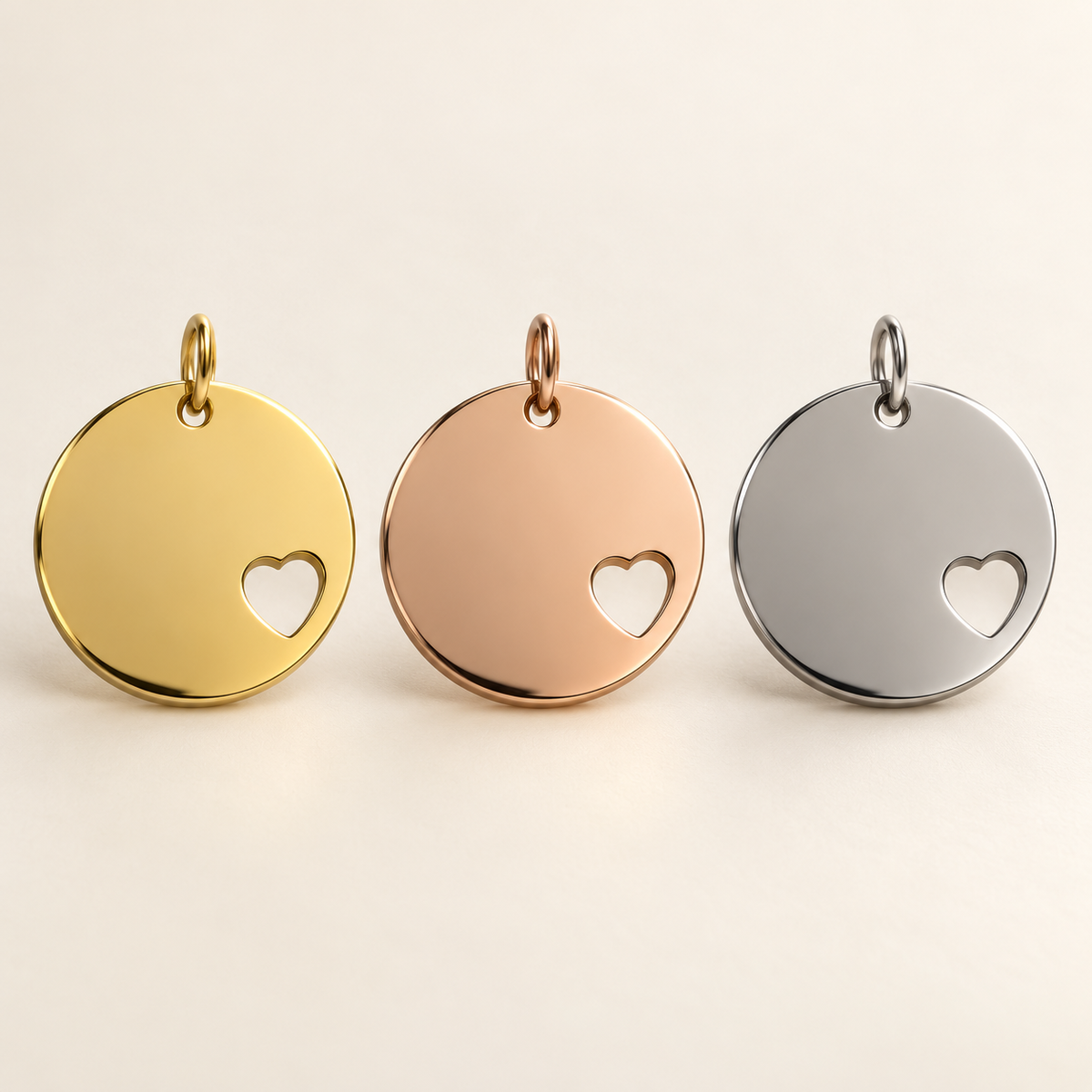 Médaillons ronds de 20 mm avec cœur ajouré : or, or rose et argent