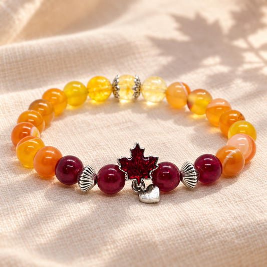 Bracelet Canada couleur, perles jaunes, orangées et bordeaux et feuille d’érable sur lin clair